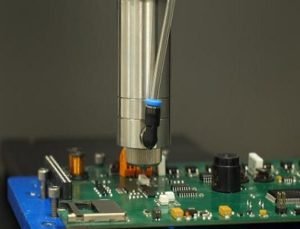 Glob Top spray dispensing tests with DELO adhesive